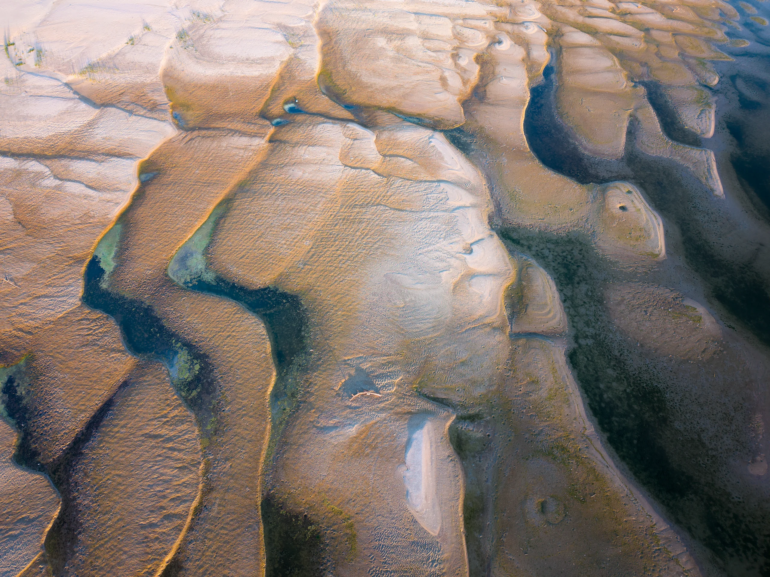 Abstract aerial photos of the receding Danube